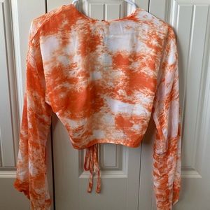 Orange and white long sleeve sheer crop top